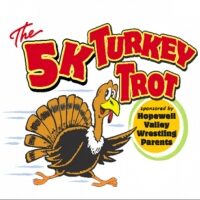 Logo for the 5K Turkey Trot event featuring a cartoon turkey.
