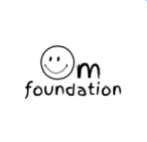 Logo featuring a smiley face and the text 'Om foundation'.